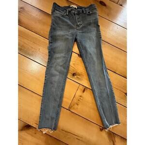 Free People women's Denim Skinny Jeans. Button Front. Raw Hem. Size 28